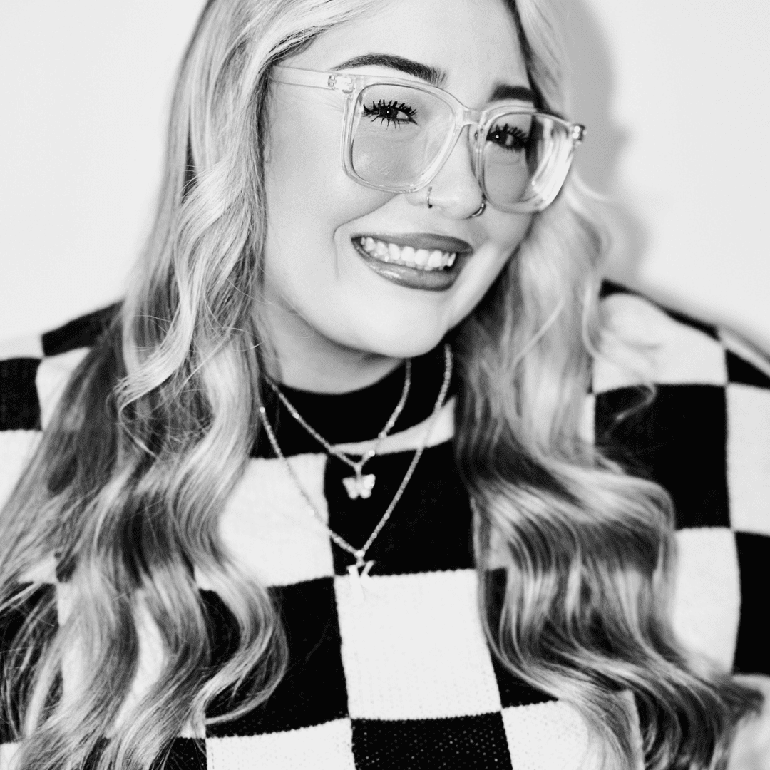 Portrait of Kayla Munro, a professional stylist at Matthew Morris Salon, showcasing their expertise and style.