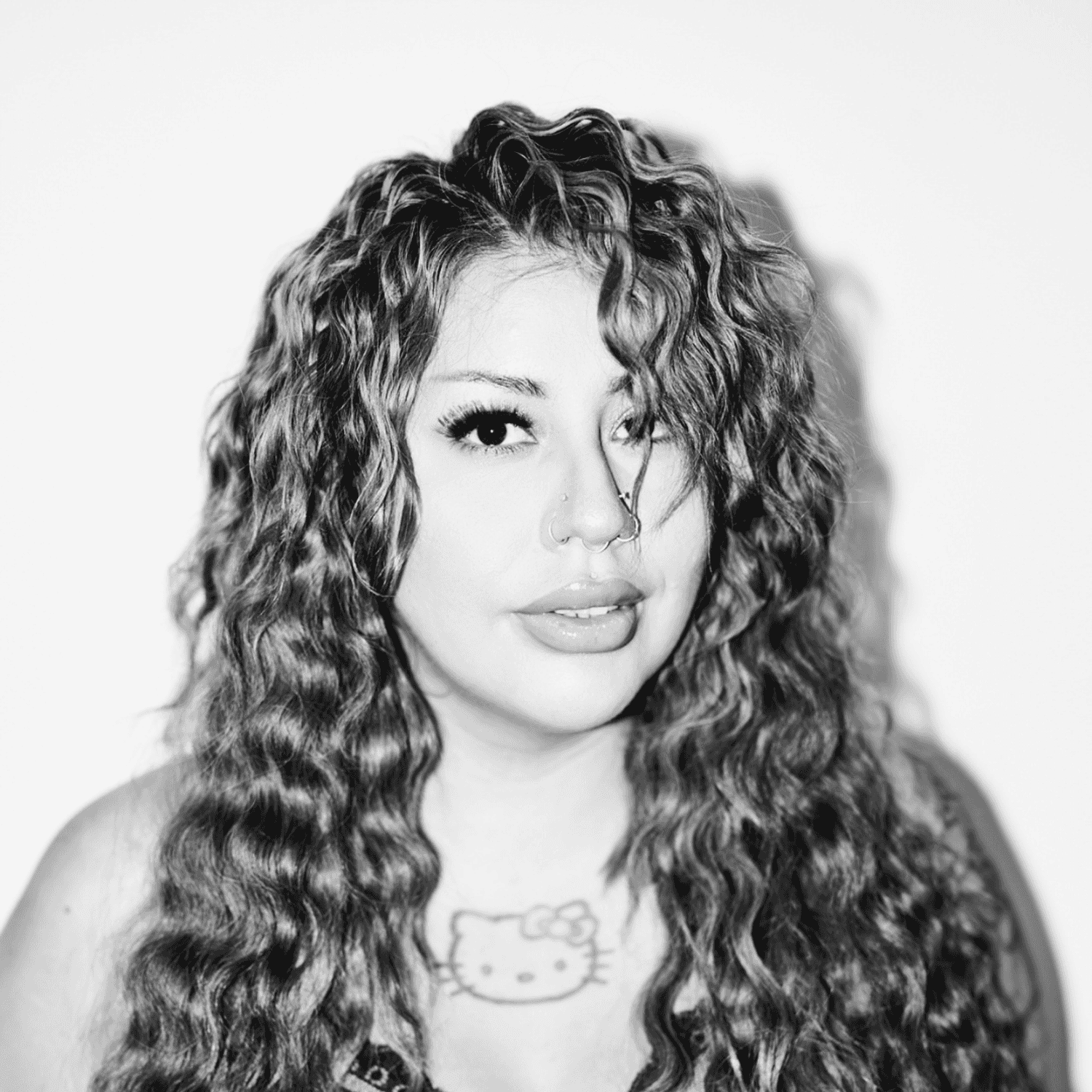 Portrait of Pia Torres, a professional stylist at Matthew Morris Salon, showcasing their expertise and style.