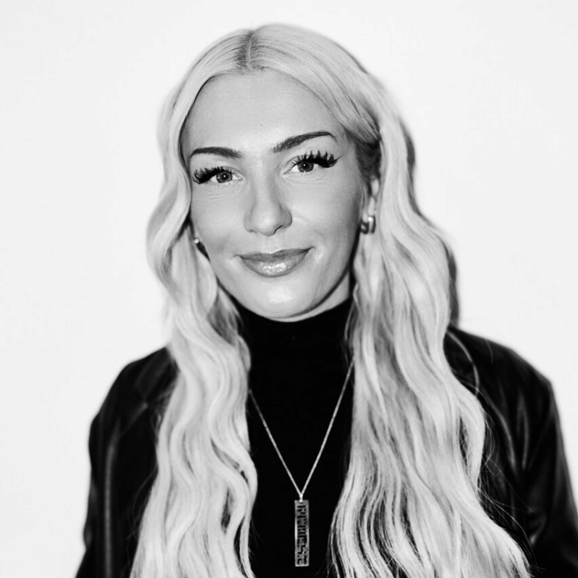 Portrait of Madison Steponski, a professional stylist at Matthew Morris Salon, showcasing their expertise and style.