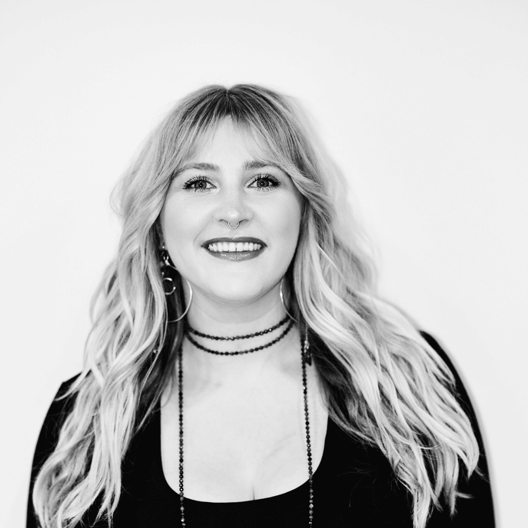 Portrait of Micah Hodges, a professional stylist at Matthew Morris Salon, showcasing their expertise and style.