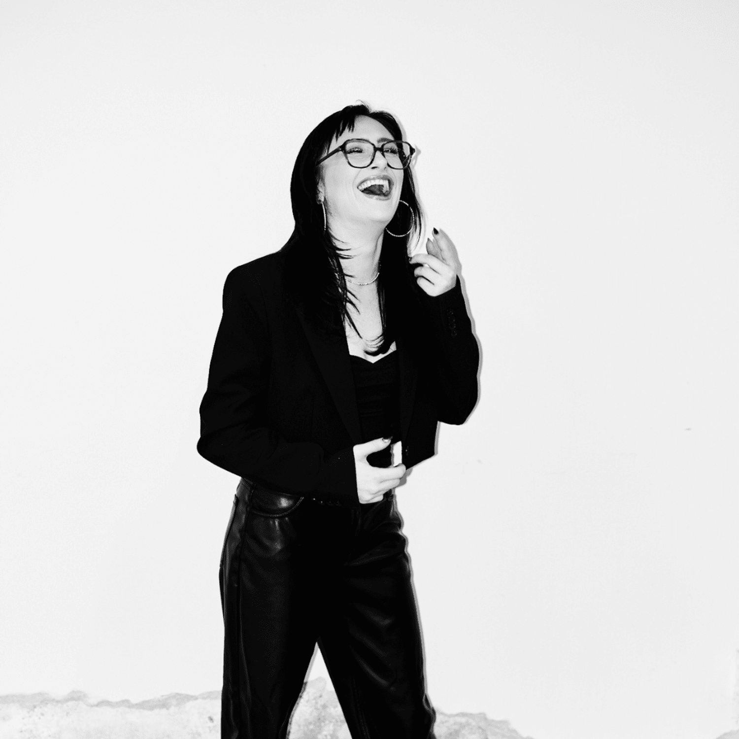 Portrait of Sydney Carrington, a professional stylist at Matthew Morris Salon, showcasing their expertise and style.