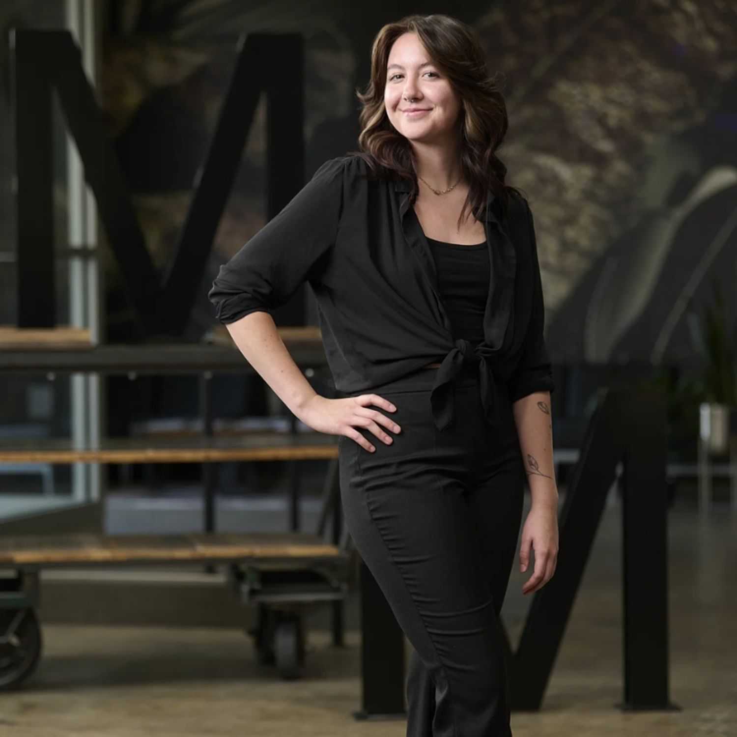 Portrait of Sydney Trevino, a professional stylist at Matthew Morris Salon, showcasing their expertise and style.