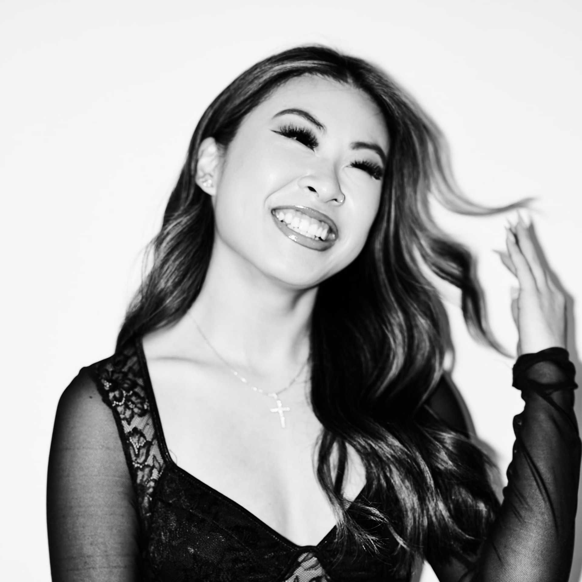 Portrait of Emily, a professional stylist at Matthew Morris Salon, showcasing their expertise and style.