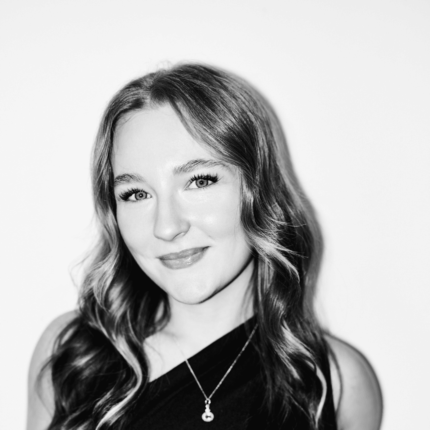 Portrait of Jess Bialy, a professional stylist at Matthew Morris Salon, showcasing their expertise and style.