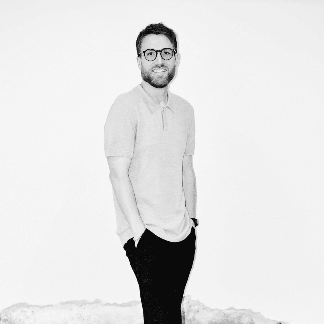 Portrait of Ainsley Wallis, a professional stylist at Matthew Morris Salon, showcasing their expertise and style.