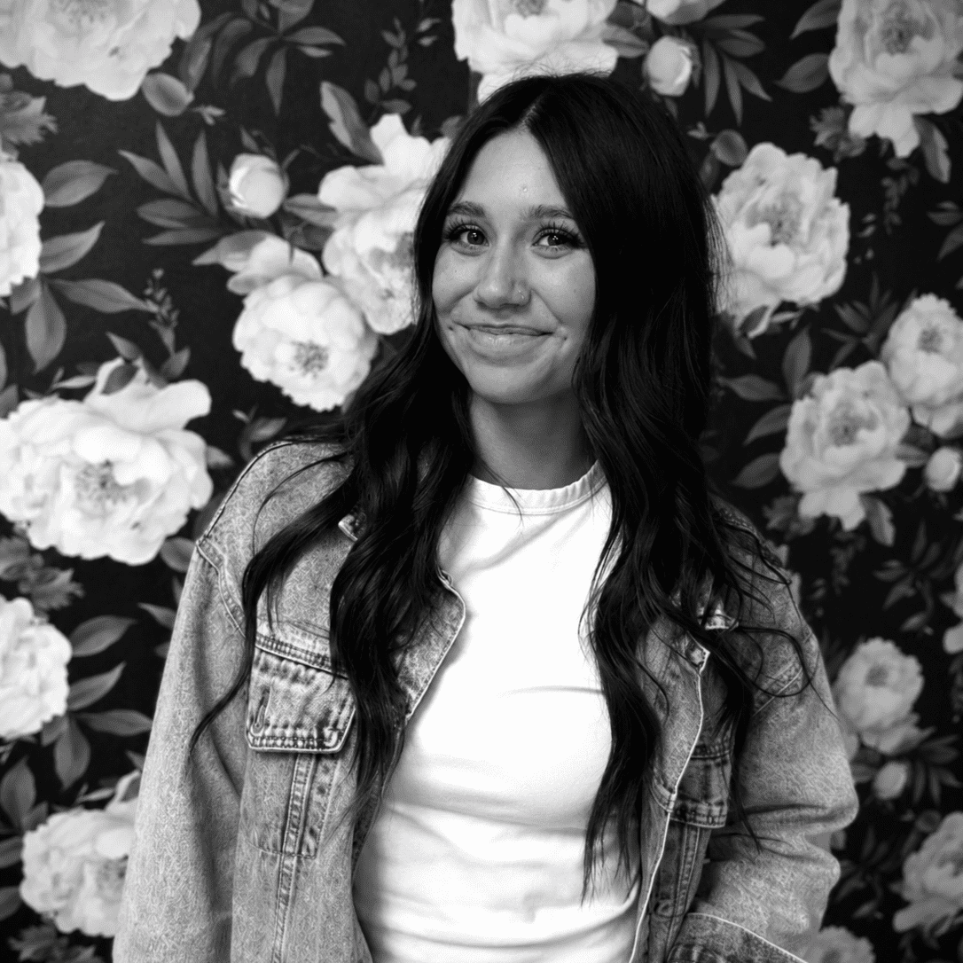 Portrait of Ali Guerrero, a professional stylist at Matthew Morris Salon, showcasing their expertise and style.