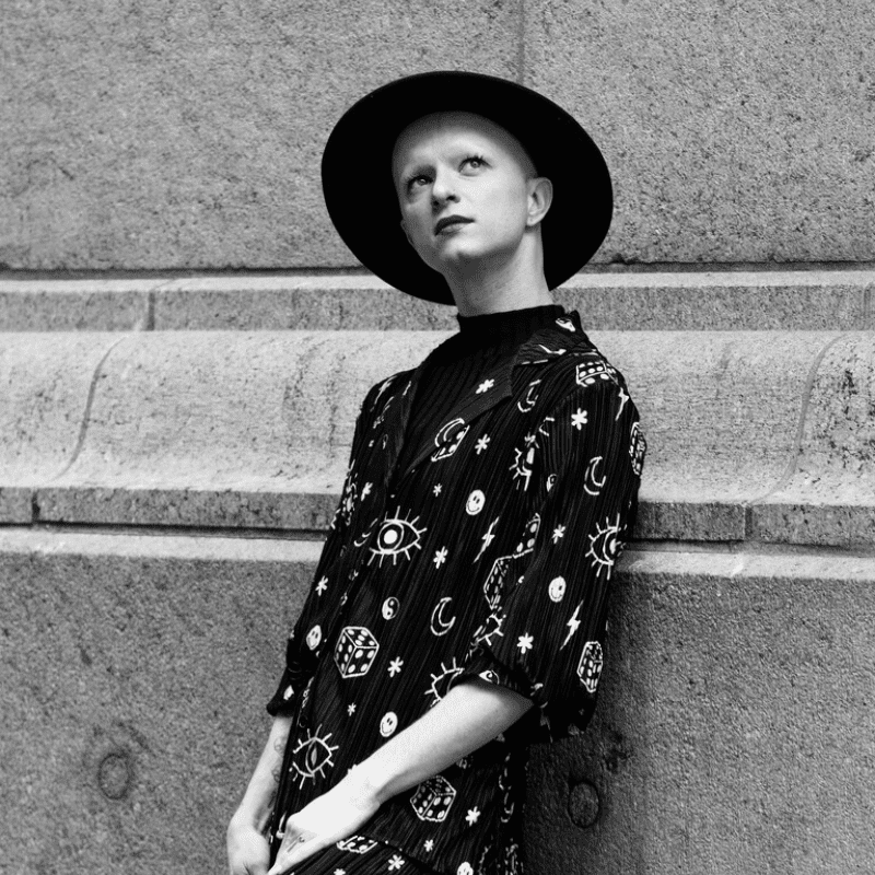 Portrait of Levi Addams, a professional stylist at Matthew Morris Salon, showcasing their expertise and style.