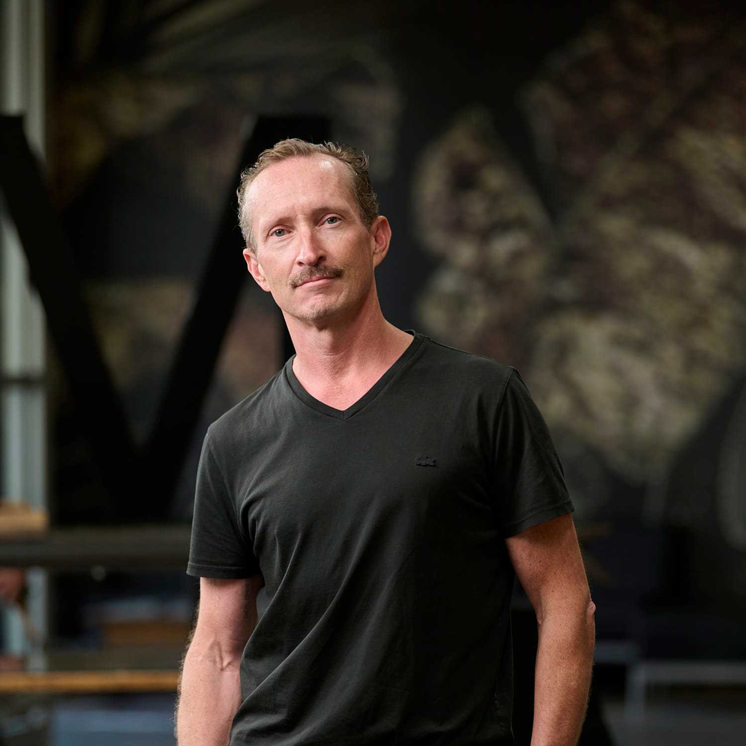 Portrait of Cameron Letterman, a professional stylist at Matthew Morris Salon, showcasing their expertise and style.