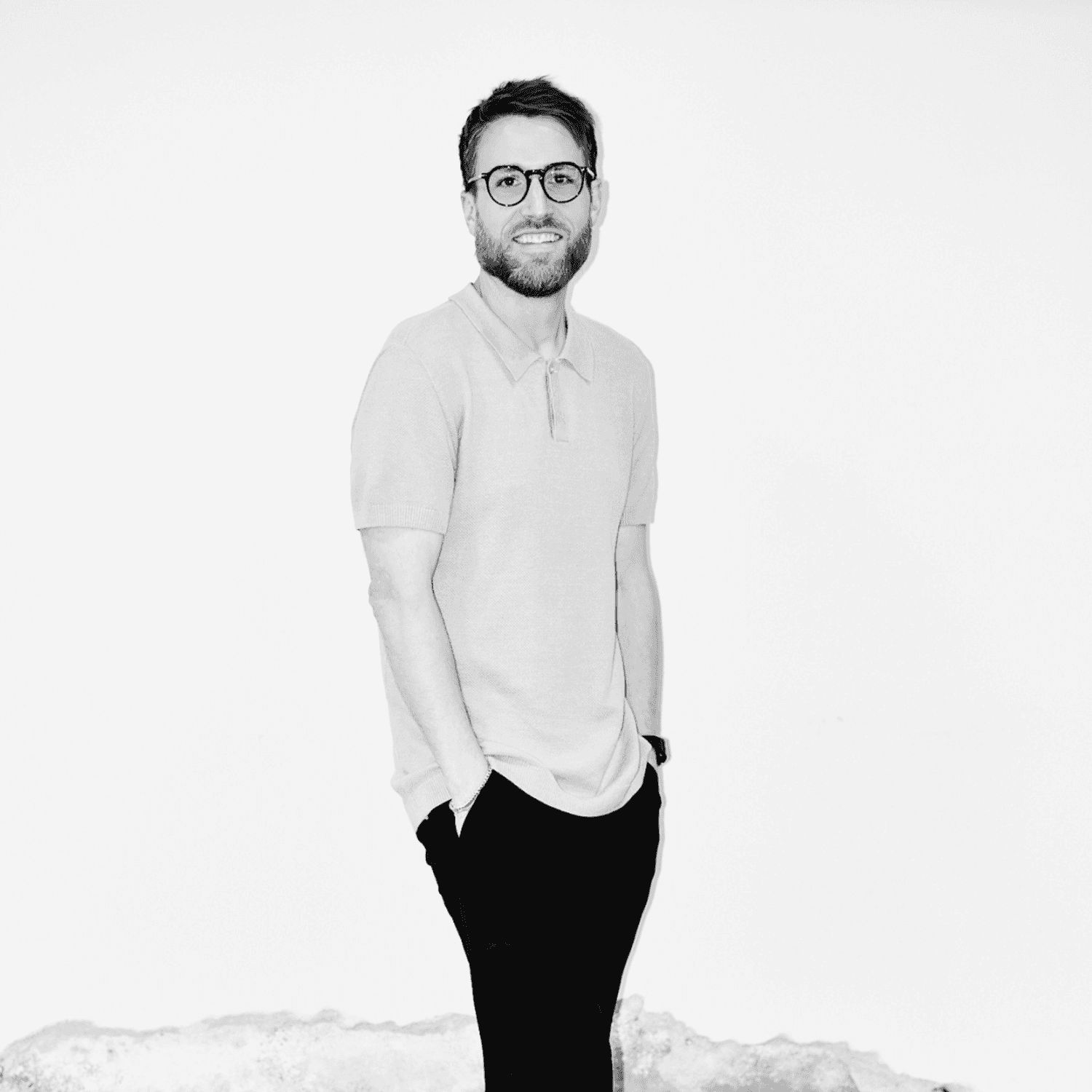 Portrait of Ainsley Wallis, a professional stylist at Matthew Morris Salon, showcasing their expertise and style.