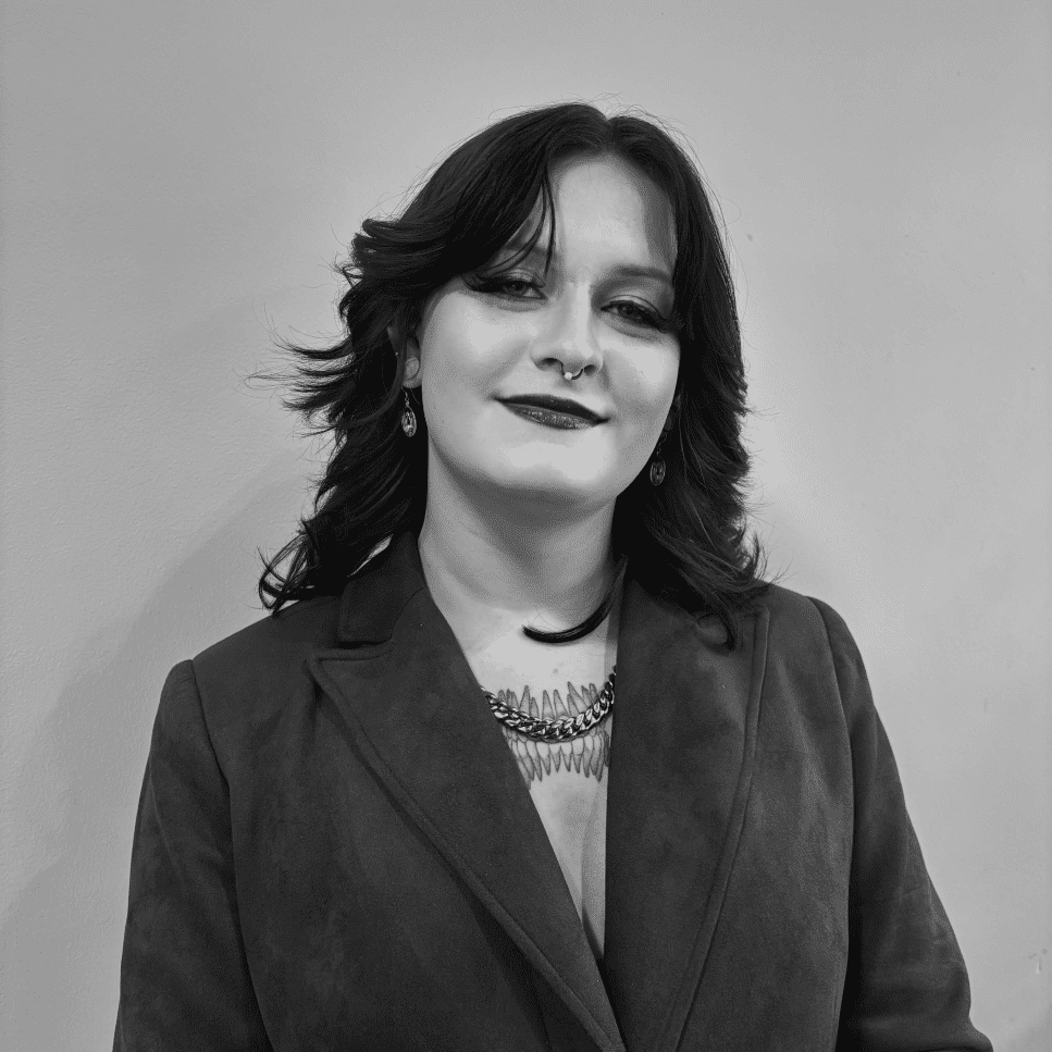 Portrait of Valentine, a professional stylist at Matthew Morris Salon, showcasing their expertise and style.