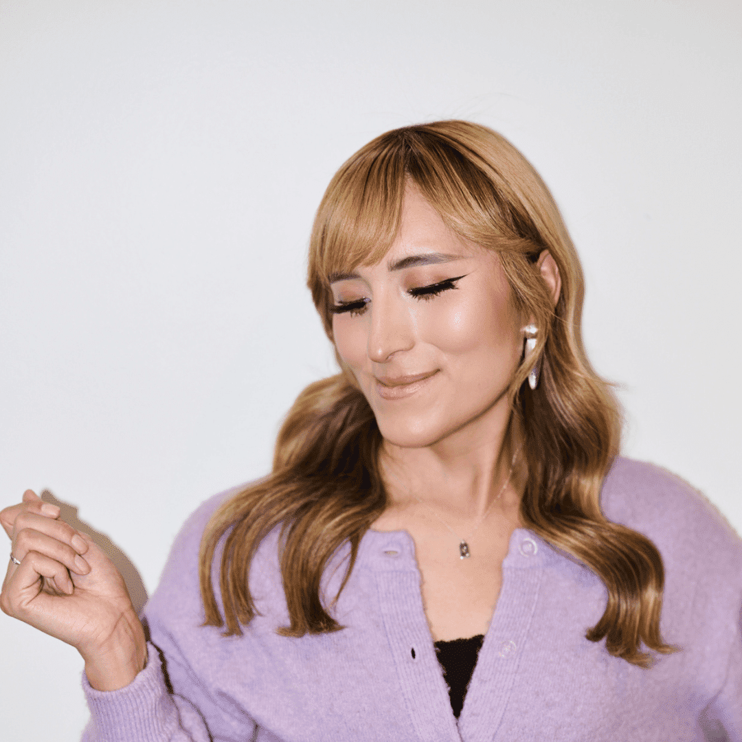 Portrait of Gracie Rattling Leaf, a professional stylist at Matthew Morris Salon, showcasing their expertise and style.