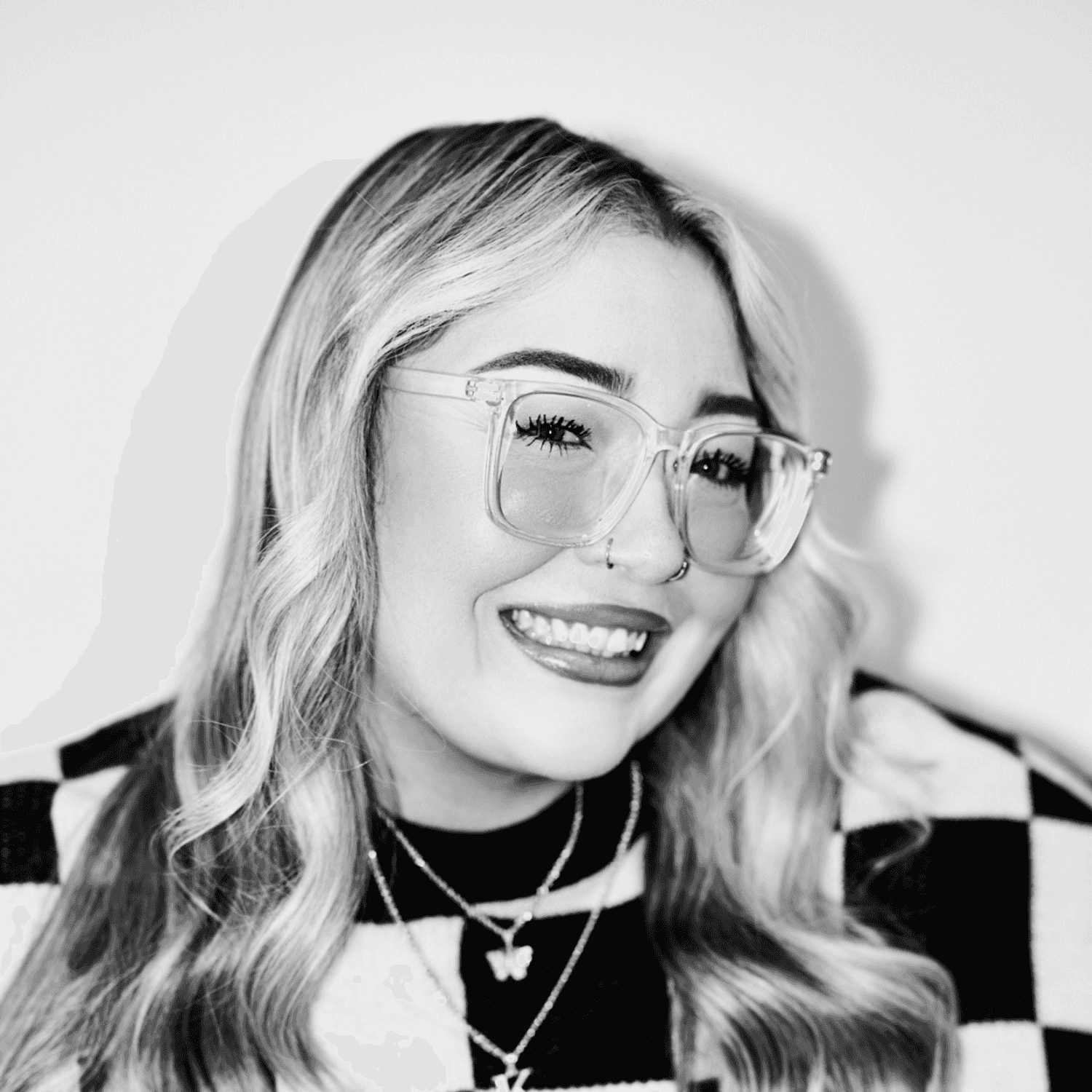 Portrait of Kayla Munro, a professional stylist at Matthew Morris Salon, showcasing their expertise and style.