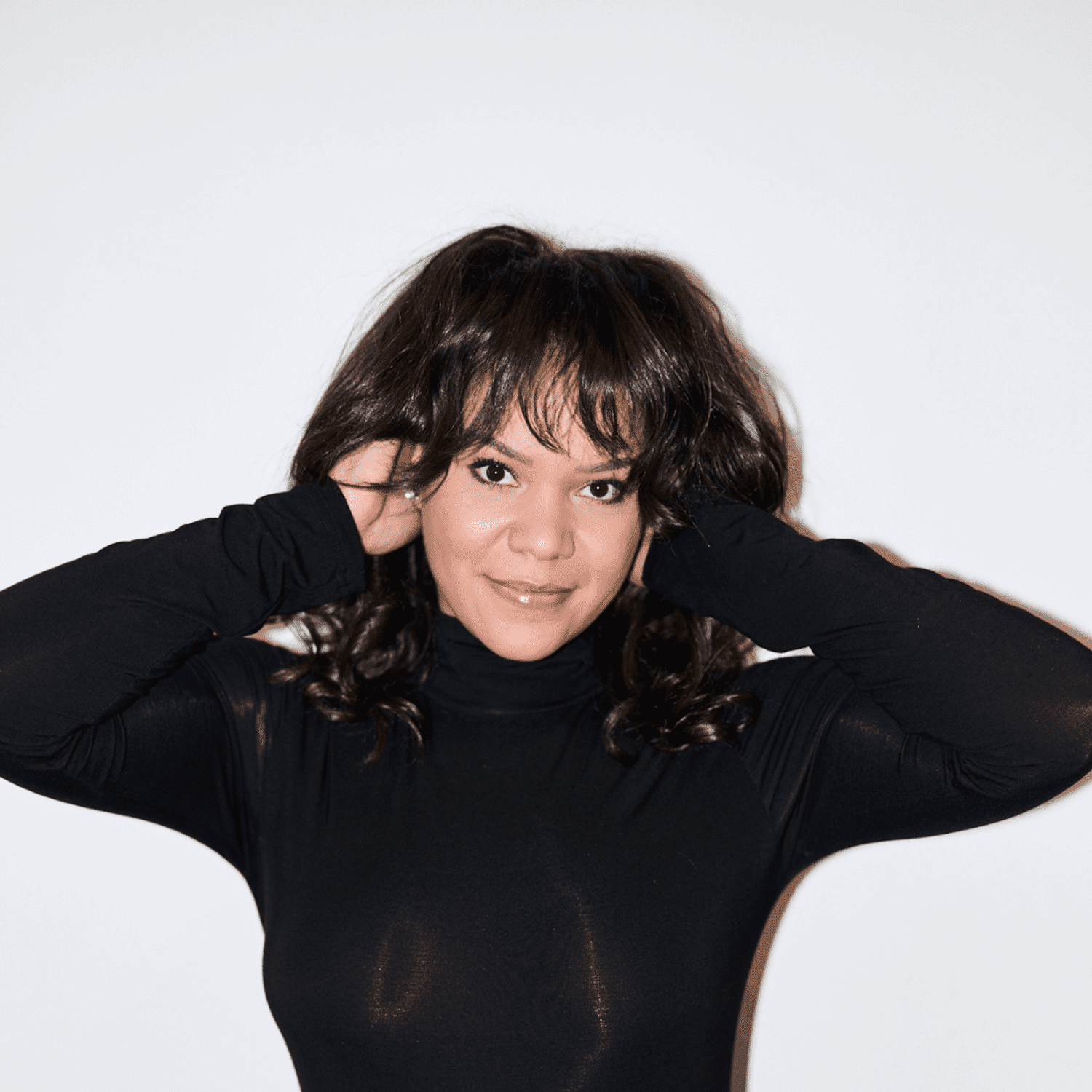 Portrait of Charity Brown, a professional stylist at Matthew Morris Salon, showcasing their expertise and style.